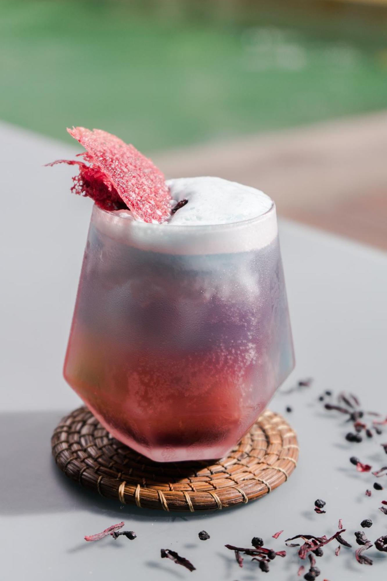 Hotel Makaaba Eco-Boutique Bacalar Exterior photo A purple rain cocktail